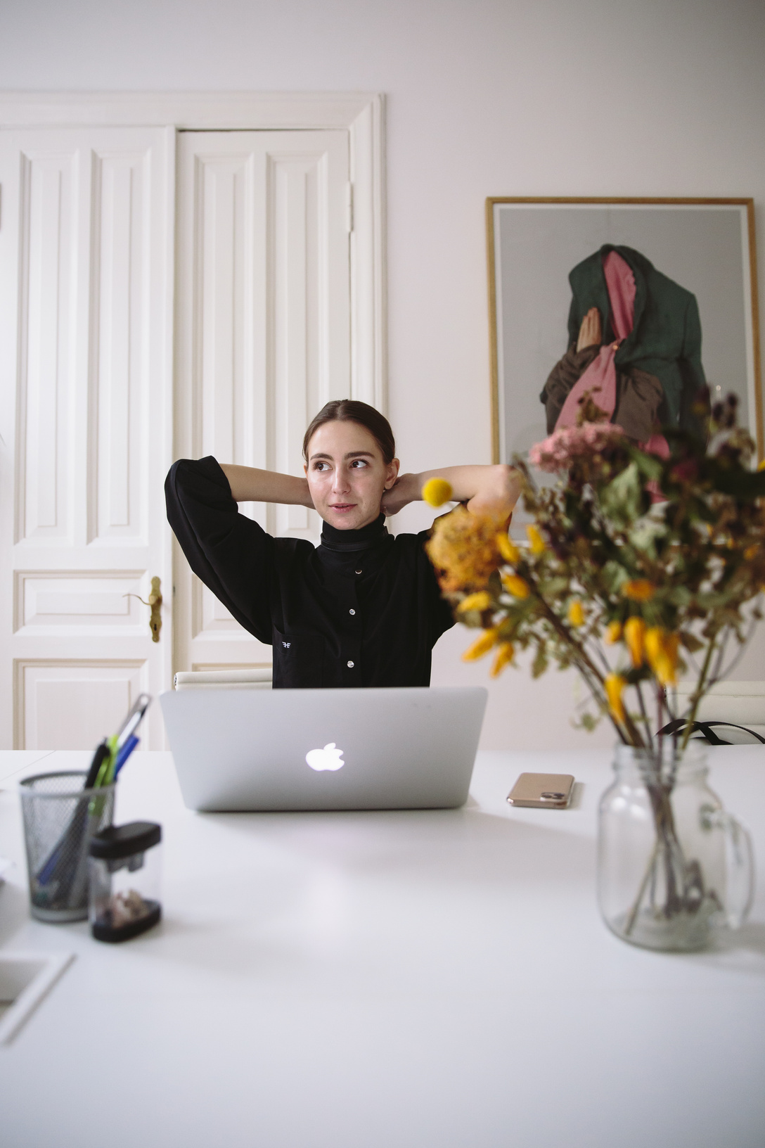 Woman Sitting in Front of Laptop